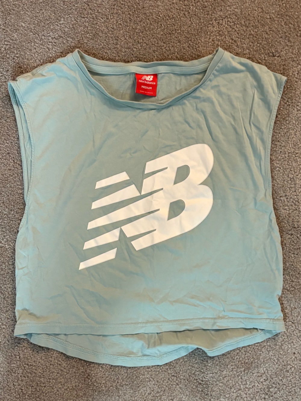New Balance teal cropped sleeveless shirt